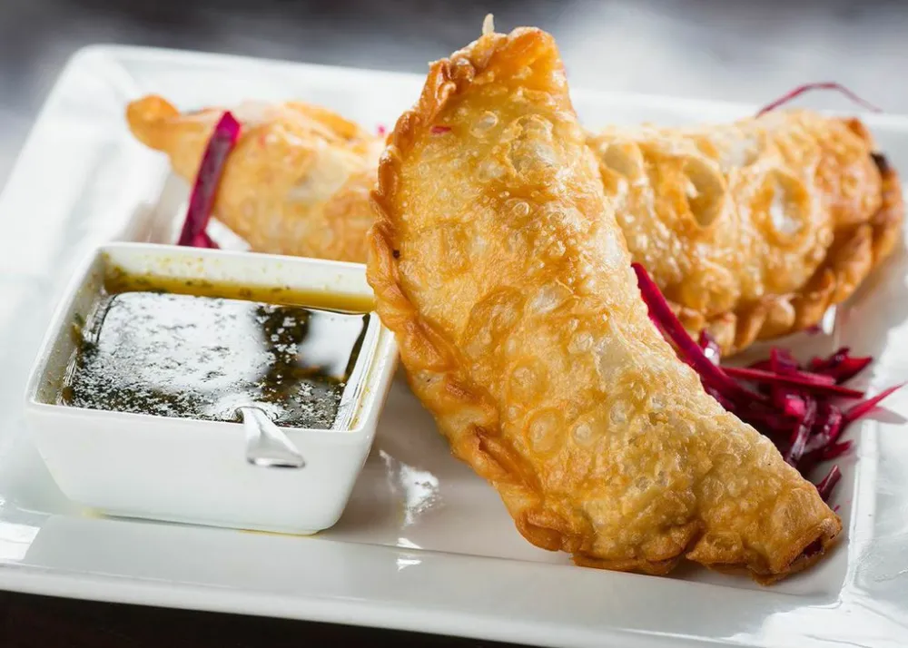 Served with chimichurri and red cabbage.