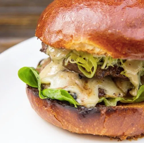 Frontier's Ostrich Juicy Lucy for National Burger Month in May is Quite Fitting
