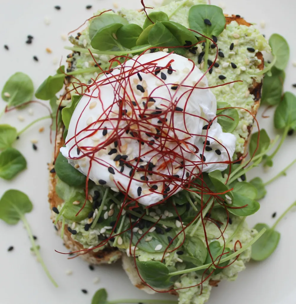 Edamame Toast with ricotta, roasted poblano, poached egg, and sesame toast for Complimentary Mom osas and more at Rhyme or Reason for Mother's Day Brunch