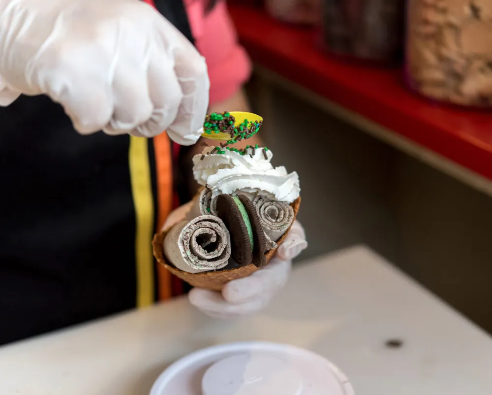 Scraped Thai ice cream shows a signature swirl pattern for Okashi Brings Thai Ice Cream with a Twist to Lakeview