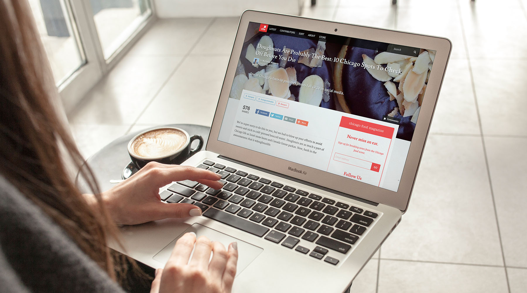 cfm girl on laptop for Advertise on Chicago Food Magazine