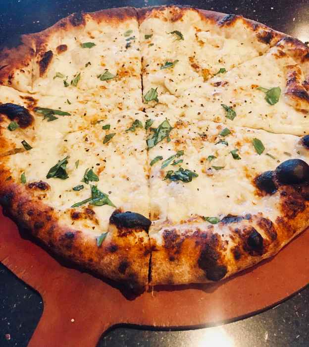Garlic Pizza for 1st Annual Garlic Fest at SLYCE Coal Fired Pizza In Honor of National Garlic Day, April 17 22