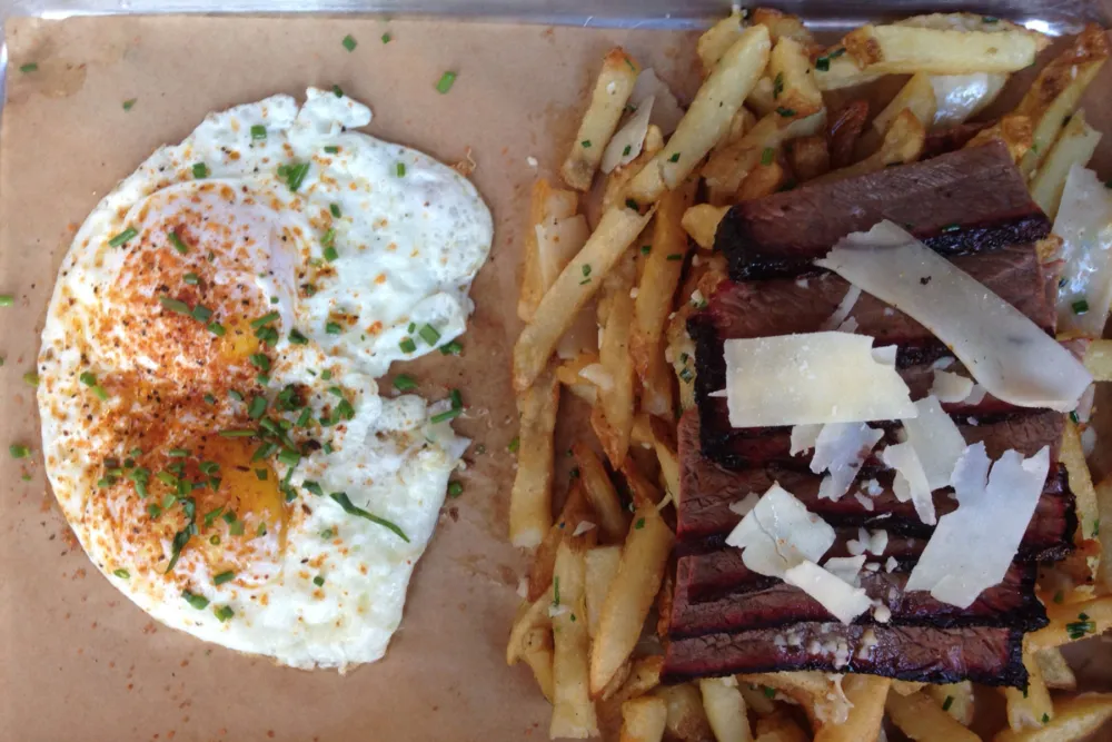Brisket and Eggs with Brunch Fries. Photo credit: Kat Levitt @agirlandherfood for Brunch and Barbeque: Q BBQ Shows You How to Do It