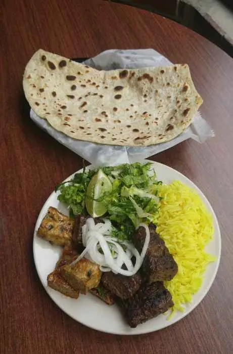 The Lunch Special at J.K. Kabab House: seekh kabab, chicken kabab, rice, salad, and bread