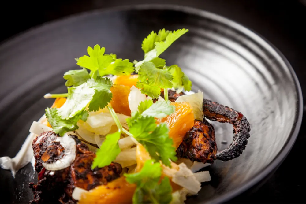 Charred Octopus Al Pastor for Rockit Bar & Grill Revamps Menu with New Executive Chef Mike Sheerin