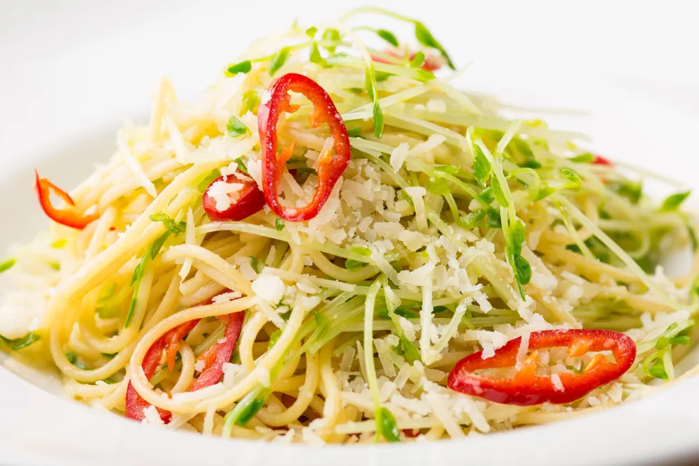 Spaghetti with pea shoots, fennel pollen, garlic, fresno peppers, lemon and pecorino romano for Tesori Trattoria Launches New Spring Menu