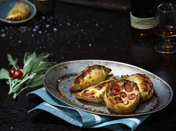 Enjoy cocktails, wine and beer with Artango's empanadas for Black Wednesday Dining and Drink Specials