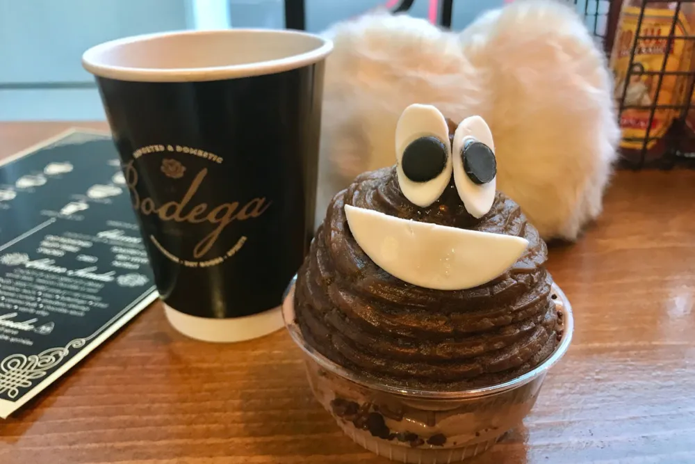 Coffee and Churrds go great with fluffy ear muffs for Churrd is the Word at La Bodega Del Barrio