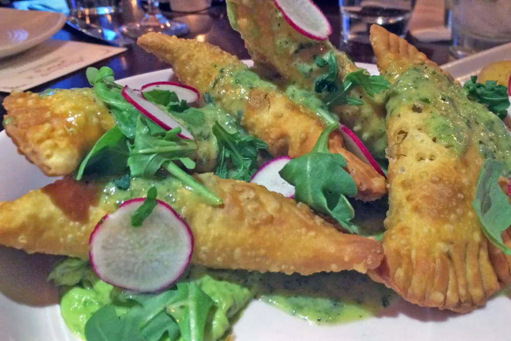 Crab Empanadas with avocado mousse and coconut curry vinaigrette for The Best of the Best Seafood at Pearl Tavern