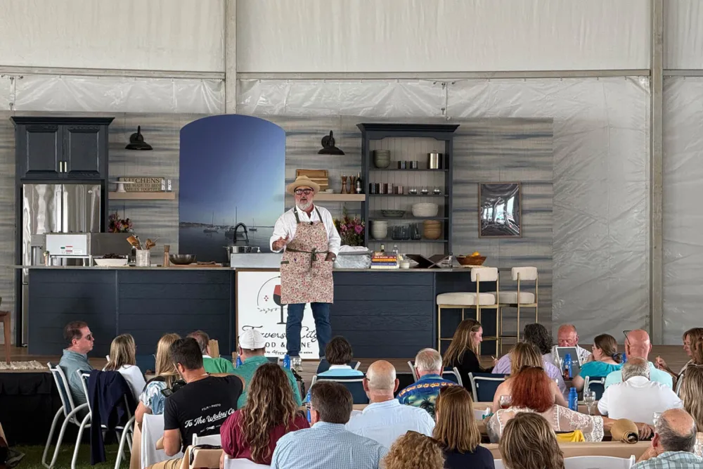 Celebrity Chef Andrew Zimmern on the main stage at TCFW for On The Road: Traverse City Food & Wine Festival