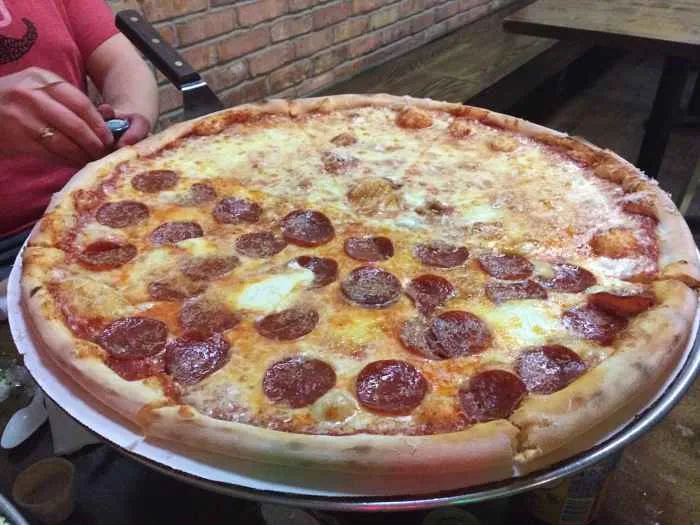 Large Pepperoni Cheese Pizza for Bring Your Bros to Dough Bros.
