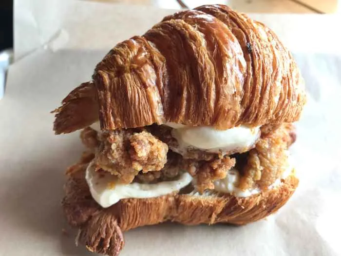 Floriole Clucker Collab for Honey Butter Fried Chicken Kicks Off This Year’s Clucker Collaboration With Floriole And The “Croissantwich”