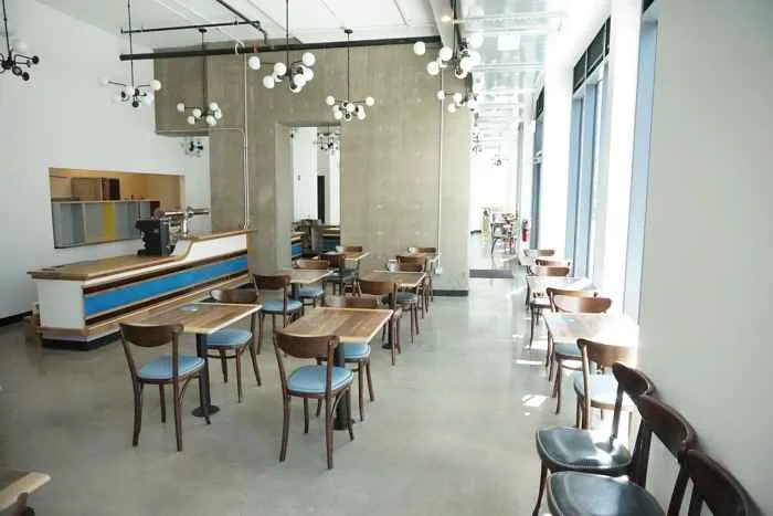 Wellsweb for Dollop Coffee Company Opens River North Location April 5