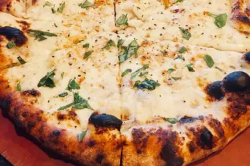 Garlic Pizza for 1st Annual Garlic Fest at SLYCE Coal Fired Pizza In Honor of National Garlic Day, April 17 22