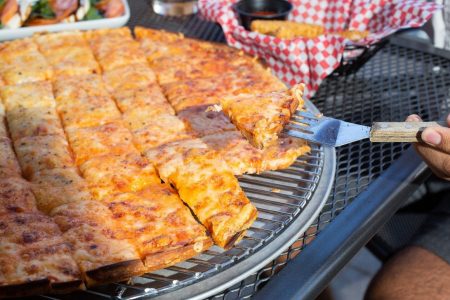 Celebrate National Pizza Day with Aurelio’s