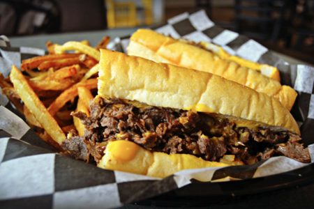 Celebrate National Cheesesteak Day at Mojo's East Coast Eats