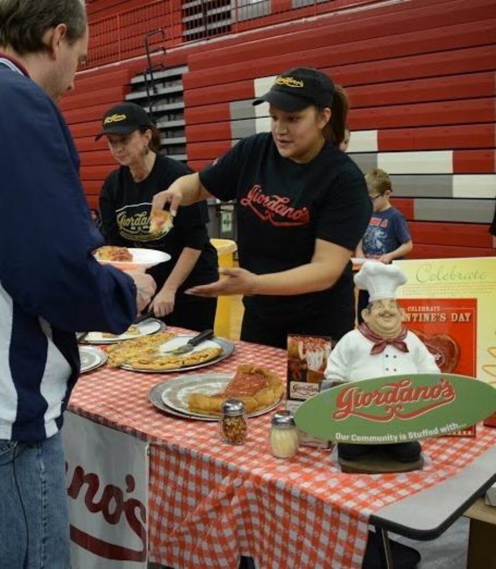 pizza serve for Sixth Annual Pizza Wars to Raise Much Needed Funds for over Fifty Homeless Students and Others in Need in the District 219 Area