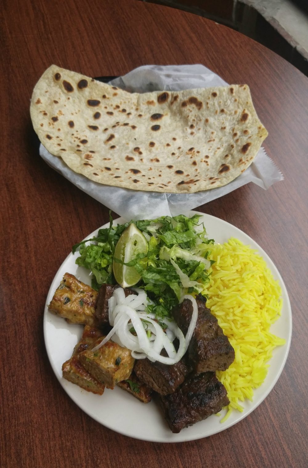 The Lunch Special at J.K. Kabab House: seekh kabab, chicken kabab, rice, salad, and bread