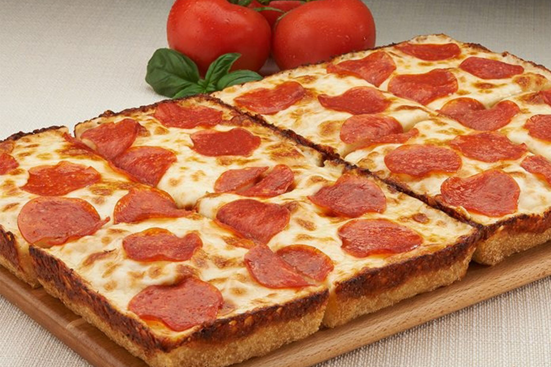 Jet's Pizza Celebrates National Cheese Pizza Day | Chicago Food Magazine