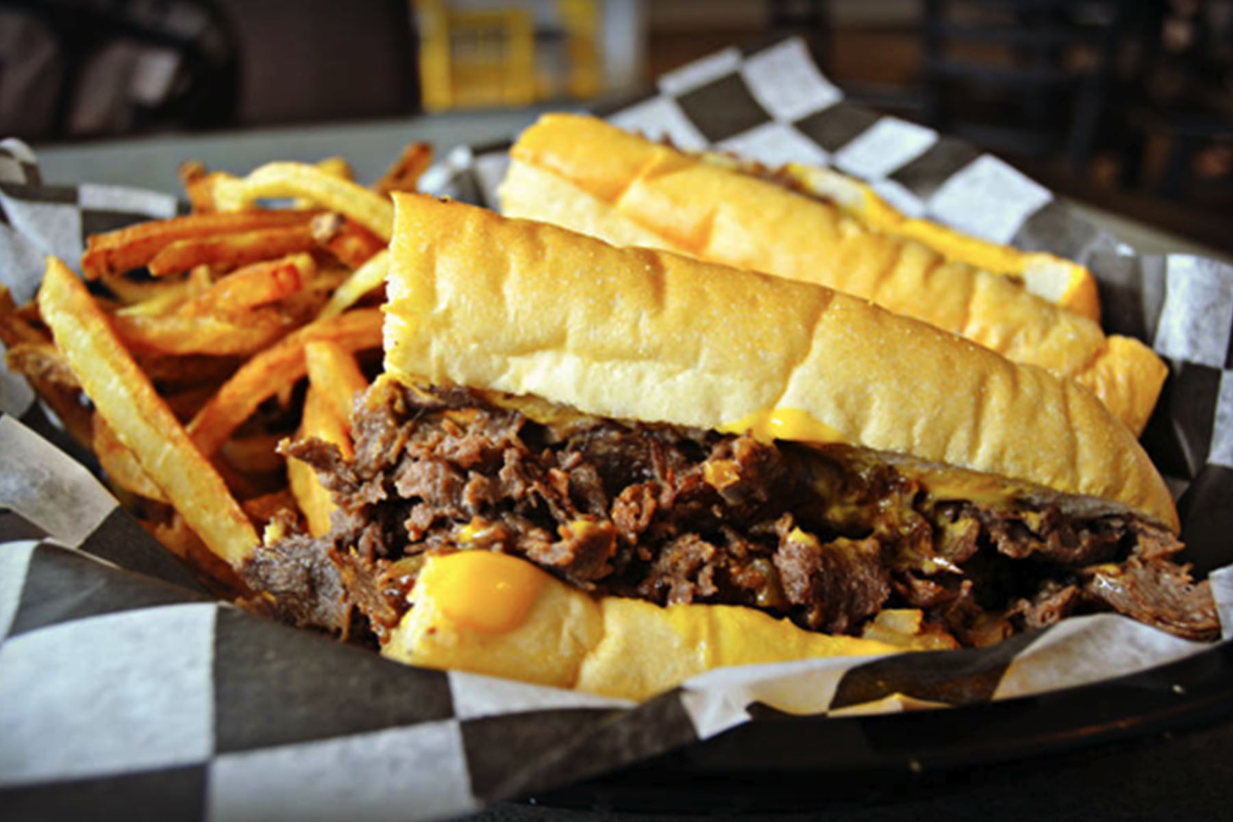 Celebrate National Cheesesteak Day at Mojo's East Coast Eats Chicago