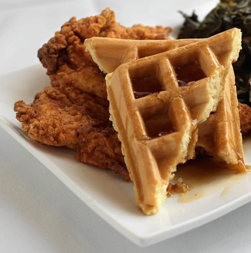 Fried Chicken 'N Waffles is a favorite brunch dish at Kit Kat. for Victoria’s Secret Fashion Show Viewing Party at Kit Kat Lounge