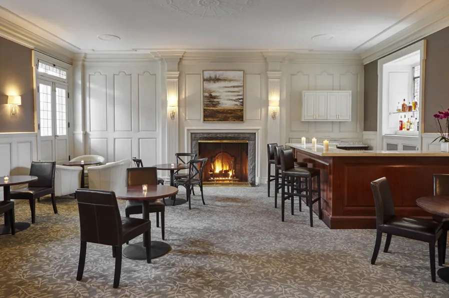 Enjoy cozy cocktails by the fire at The Lounge inside The Homestead Hotel. for Fireside Cocktail Class at Hearth in Evanston