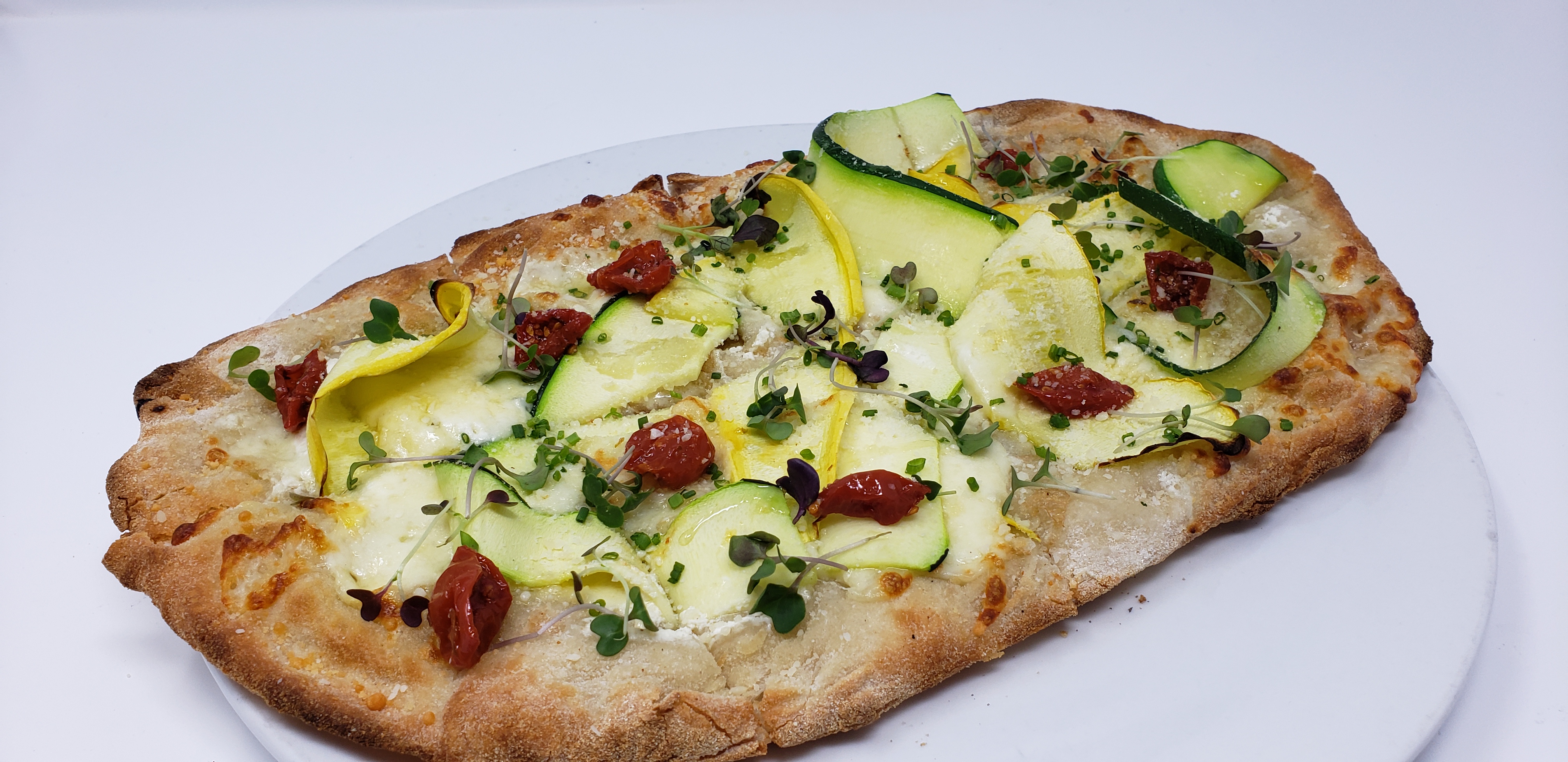 Casati’s Celebrates National Cheese Pizza Day with Buy One Get One Free Cheese Pinsas Chicago