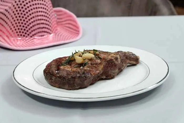 Bone In Cowgirl Steak With Pink Hat for Chicago Restaurants Donating Proceeds to Breast Cancer Foundations