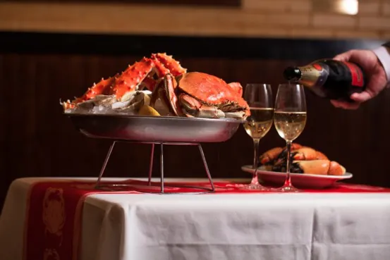 Champagne and Crab at Shaw's Crab House Schaumburg Photo Courtesy of RR Public Relations for New Years Eve and Day Celebrations Across Chicago