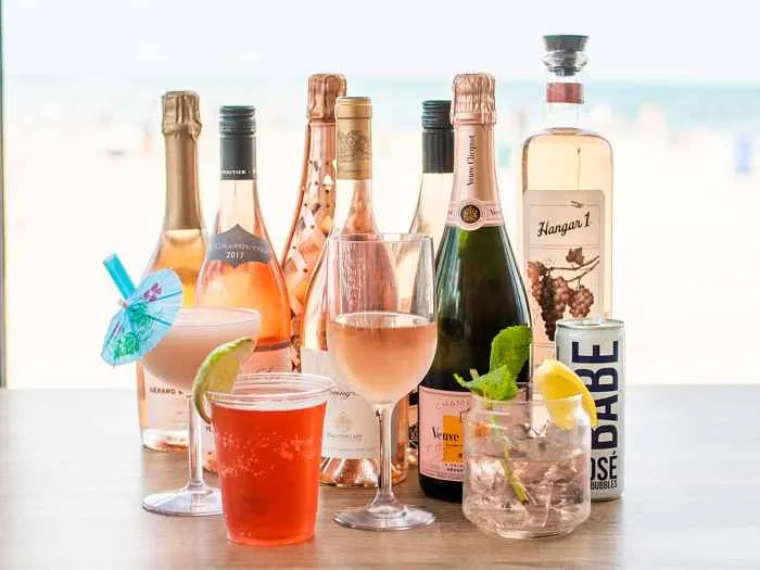 Sipping Rosé on the beach sounds good to us! Photo Courtesy of Corey Baker for Where to Cheers this Weekend in Lincoln Park for National Rosé Day