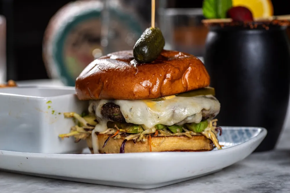 Bocaditos Oaxaca Burger2 Photocredit Bocaditos for Where to Chow Down for National Burger Month 2026
