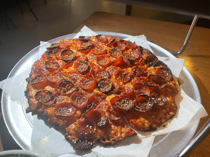 Peppy Boy made with old world pepperoni, hot honey, mozzarella, parmesan, wild oregano, tomato sauce and Calabrian chili oil for Review: Dicey's Pizza & Tavern in Lincoln Park