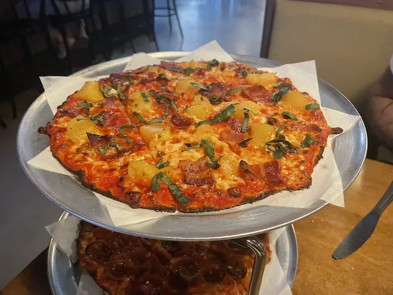 The Hawaiian, a tomato sauce based ‘za topped with mozzarella, REAL bacon, pineapple and fresh basil for Review: Dicey's Pizza & Tavern in Lincoln Park