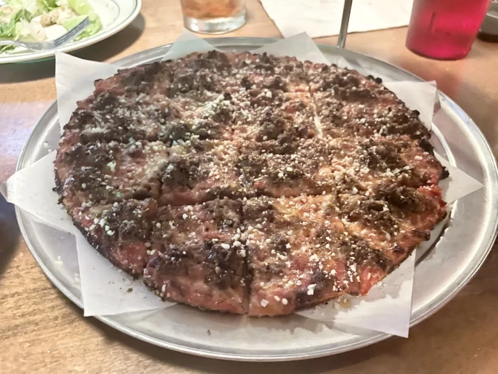 Classic Sausage, another tomato sauce based canvas smattered with finely crumbled and house made Italian sausage alongside melty mozzarella and parmesan for Review: Dicey's Pizza & Tavern in Lincoln Park