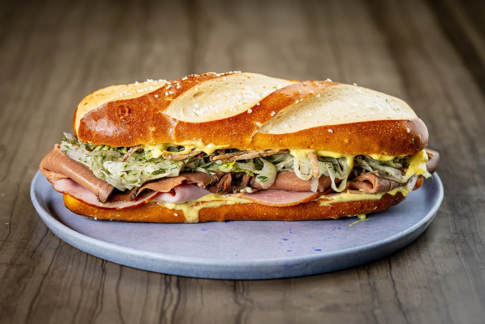 Image for Hannah's Bretzel Teams Up With West Loop's Elske To Launch Latest Chef Series Sandwich THE PØLSER!