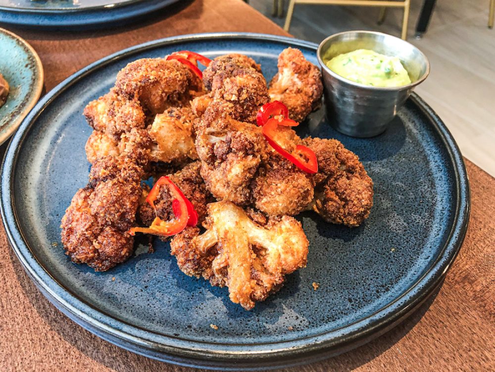 Worldly Flavors Meet Local Ingredients at Oaken Bistro + Bar