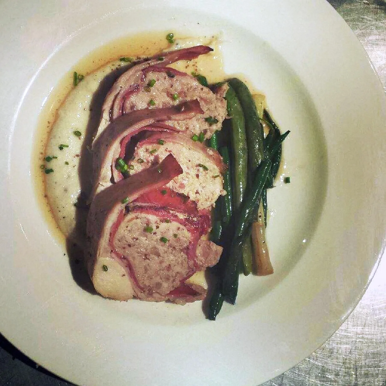 rabbit prosciutto roulade over corn grits for The Northman, Chicago's First Cider Pub, to Open in February