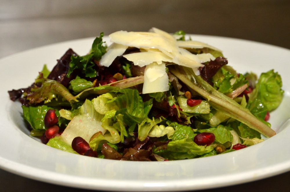 Mixed Green Salad with Pumpkin Seeds, Parmesan, and Pomegranate and Balsamic Dressing