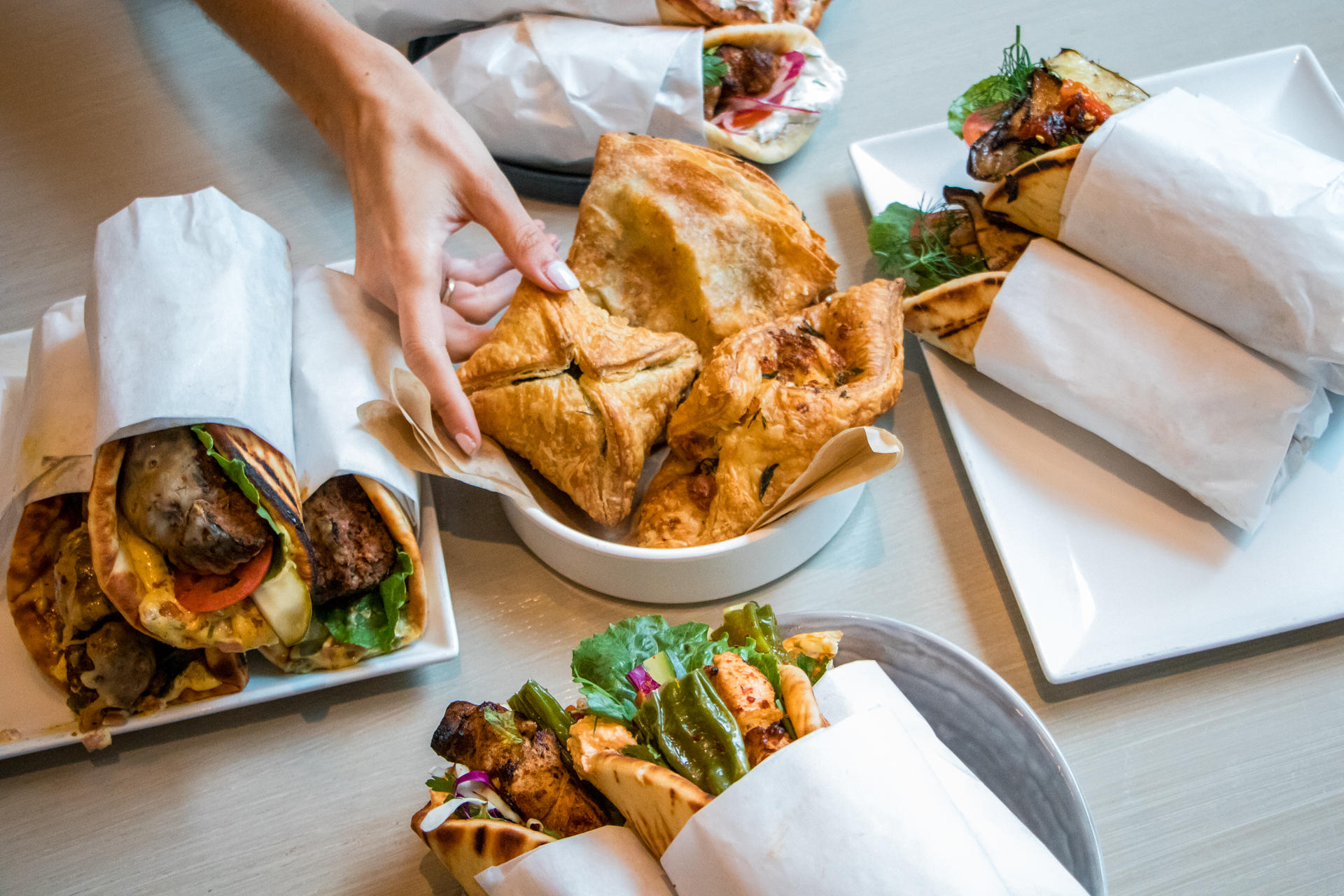 Pitaki Savory Greek Pies Pita Wraps for Avli Announces New Quick Service Restaurant Planned for Fulton Market