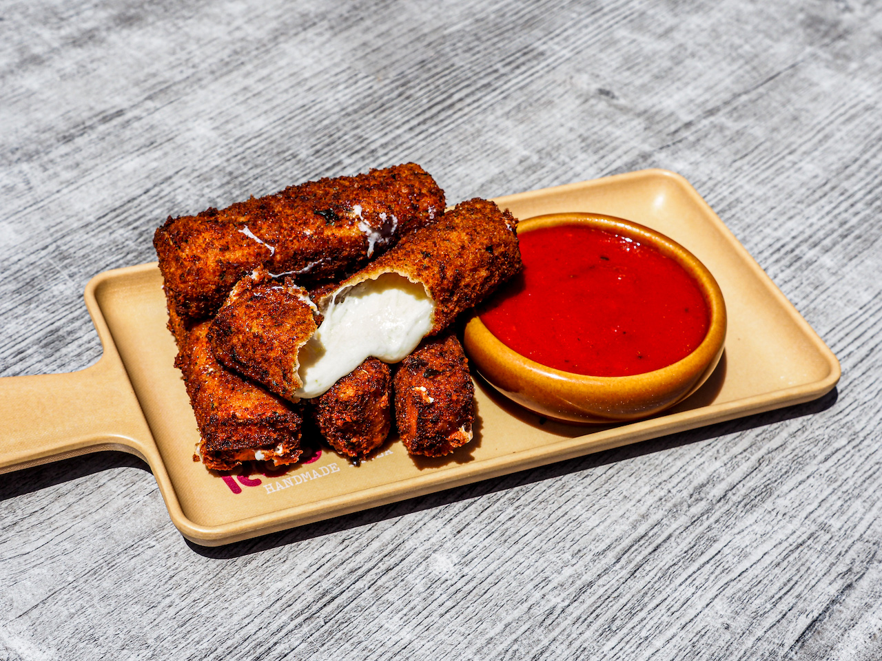 Roots Pizza Mozzarella Sticks for Roots Pizza Announces Sale of Millionth Mozzarella Stick, Winner Gets Free Mozzarella Sticks for a Year