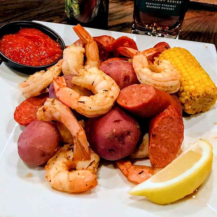 The Rambler Shrimp Boil Plate 2 for What to do in February: Celebrate Black History Month, Mardi Gras and More!