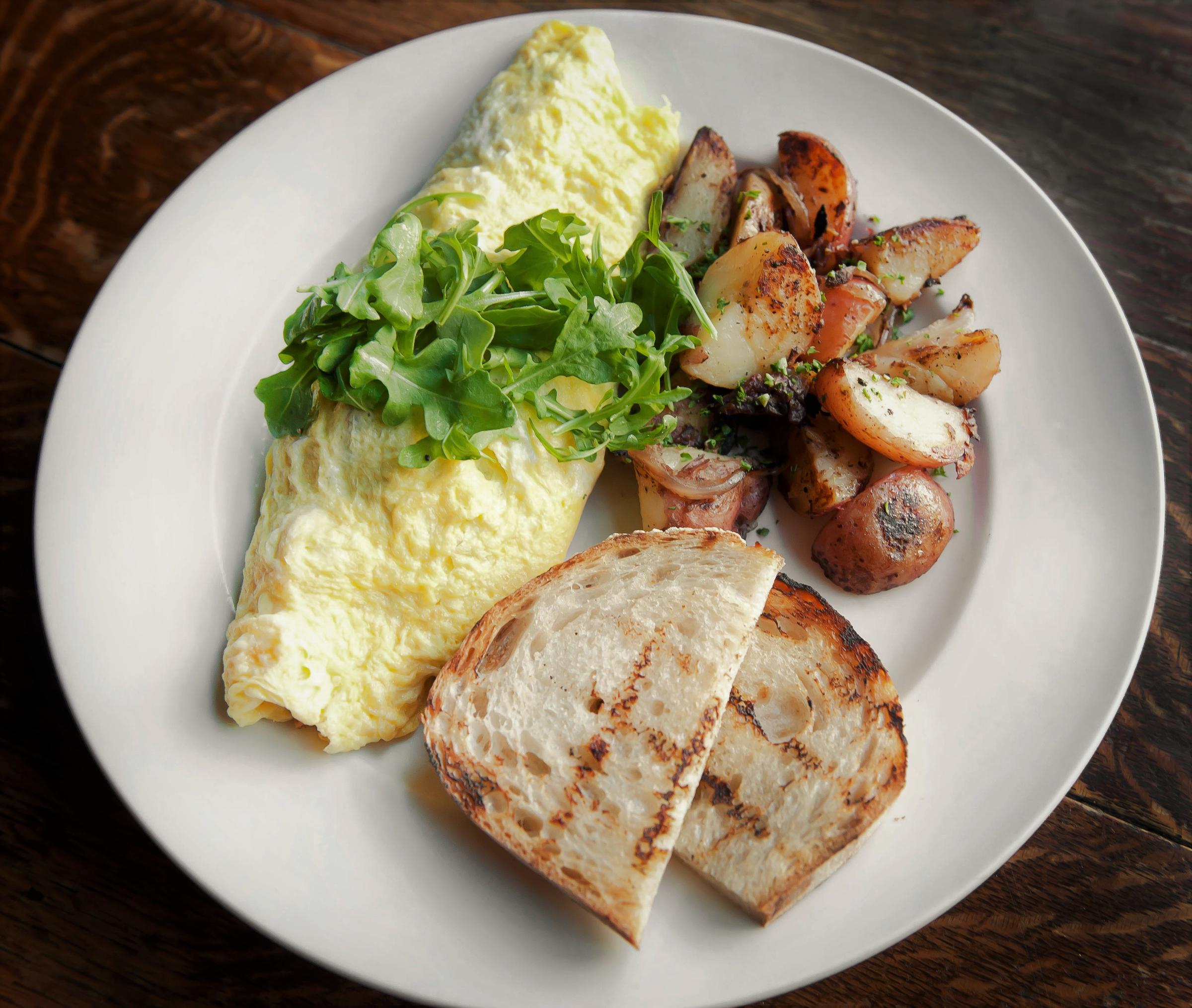 Tumans Omelet Filter for New Year’s Day Hangover Brunch at Tuman’s Tap & Grill