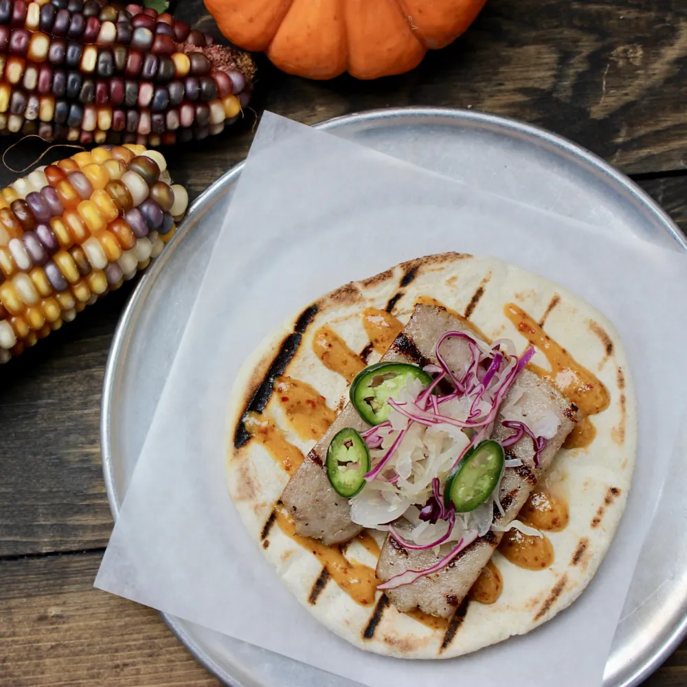 Taco Joints Jalisco Bratwurst Taco for Oktoberfiesta Specials at Taco Joint