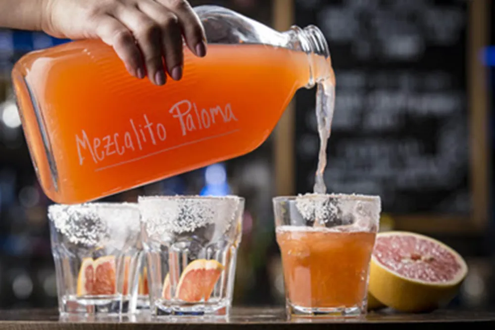 Draft Paloma: Mezcal, tequila, grapefruit soda for Mercadito Launches New Lounge: Mezcalito