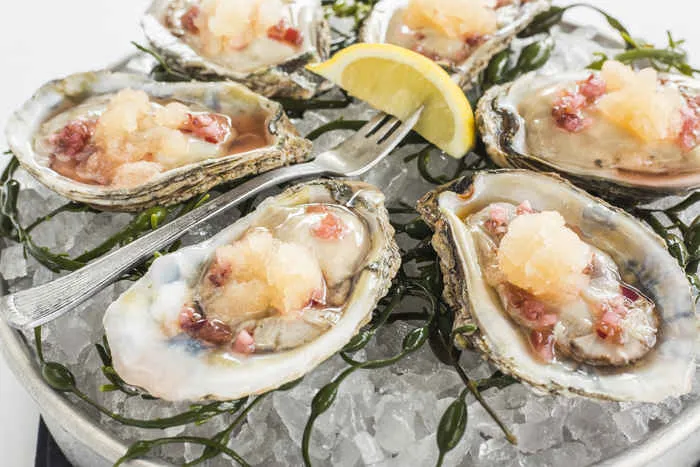 Courtesy of Ocean Prime Chicago for National Oyster Day Specials at Chicago Restaurants