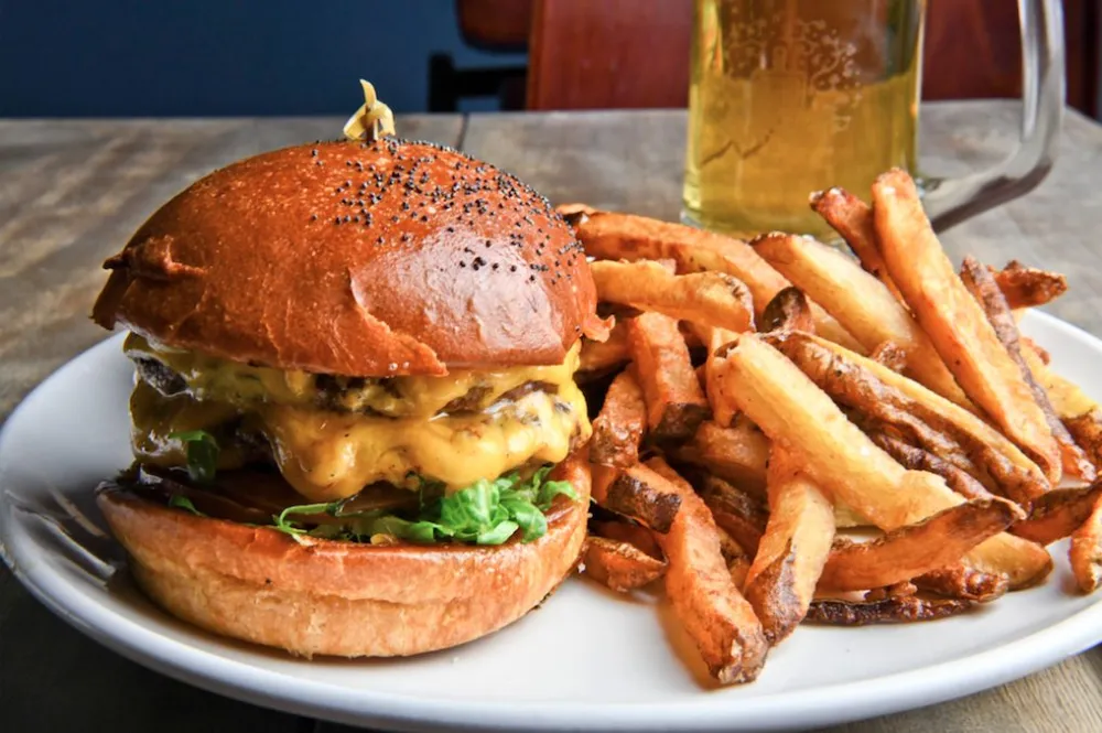 Courtesy of Dusek's Board & Beer for May is National Burger Month Where to Get Burgers To Go