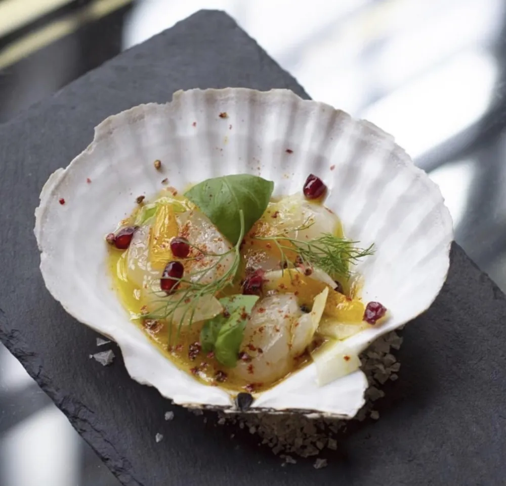 The Bay Scallop Crudo (Photo courtesy of Ella Elli) for Valentine's Day Dining and Carryout Specials Around the City