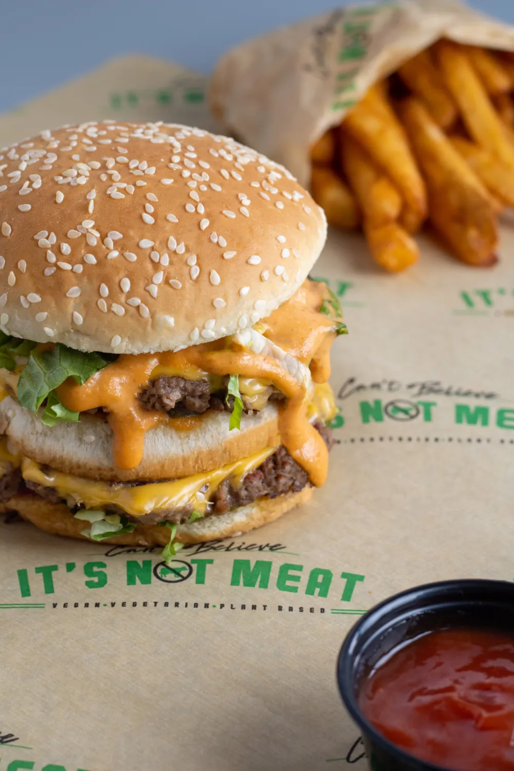 The Big Mik Burger CBINM's vegan take on the Big Mac. (Photo courtesy of Sofia Karpova) for Chicago Eateries, Can’t Believe It’s Not Meat and Phlavz Bar and Grille, Open Second Locations Together in Orland Park
