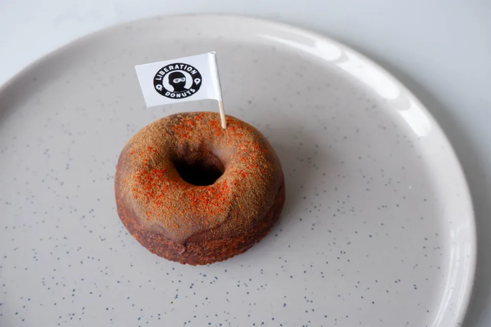 Firestorm dusted with cinnamon and chili powder for We Ate All the Donuts at Liberation Donuts and Have the Pics to Prove It