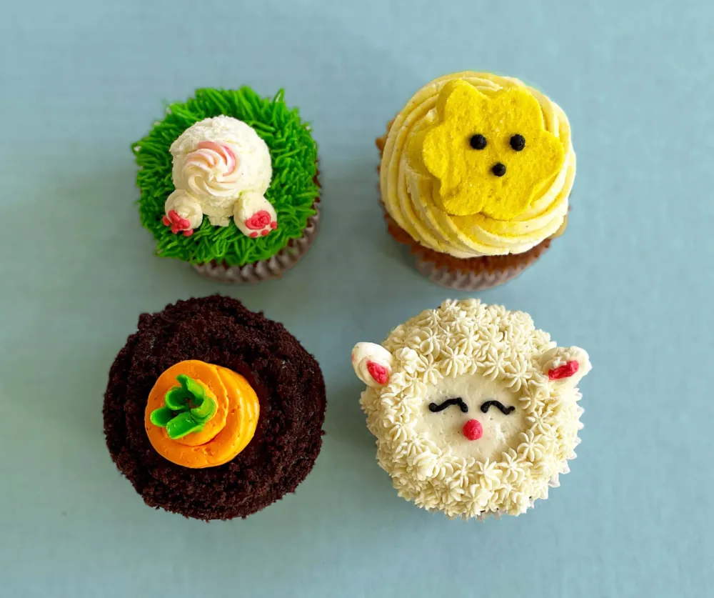 The Easter Cupcakes 4 pack includes the following festive flavors: Carrot Cake, Chocolate, Citrus with House Made Peep, Graham Cracker (Photo courtesy of Sugargoat) for Easter and Passover Specials Across Chicago